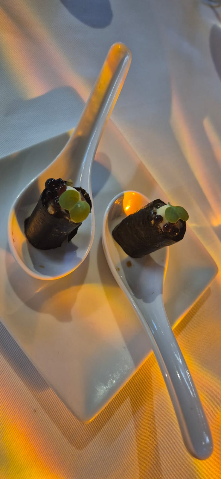 Nori rolls presented on spoons