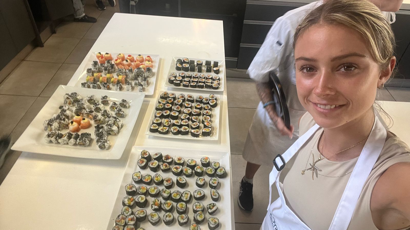 Aeron with sushi platters